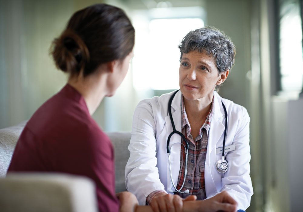 Doctor answering questions at Crescent Clinic